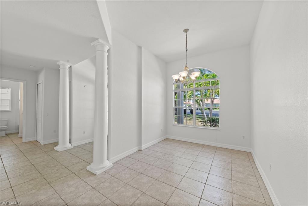 9623 Springlake Circle Estero, FL 33928 - Photo 8 of 47 a view of an empty room and window