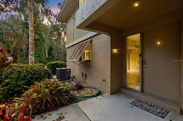 a backyard of a house with lots of green space