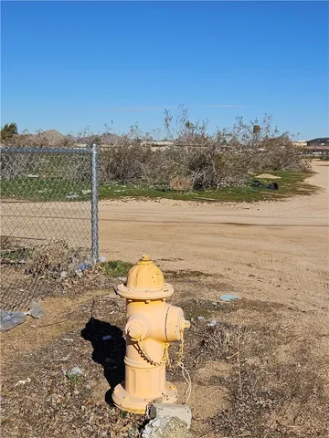 a view of a water fountain and an outdoor space