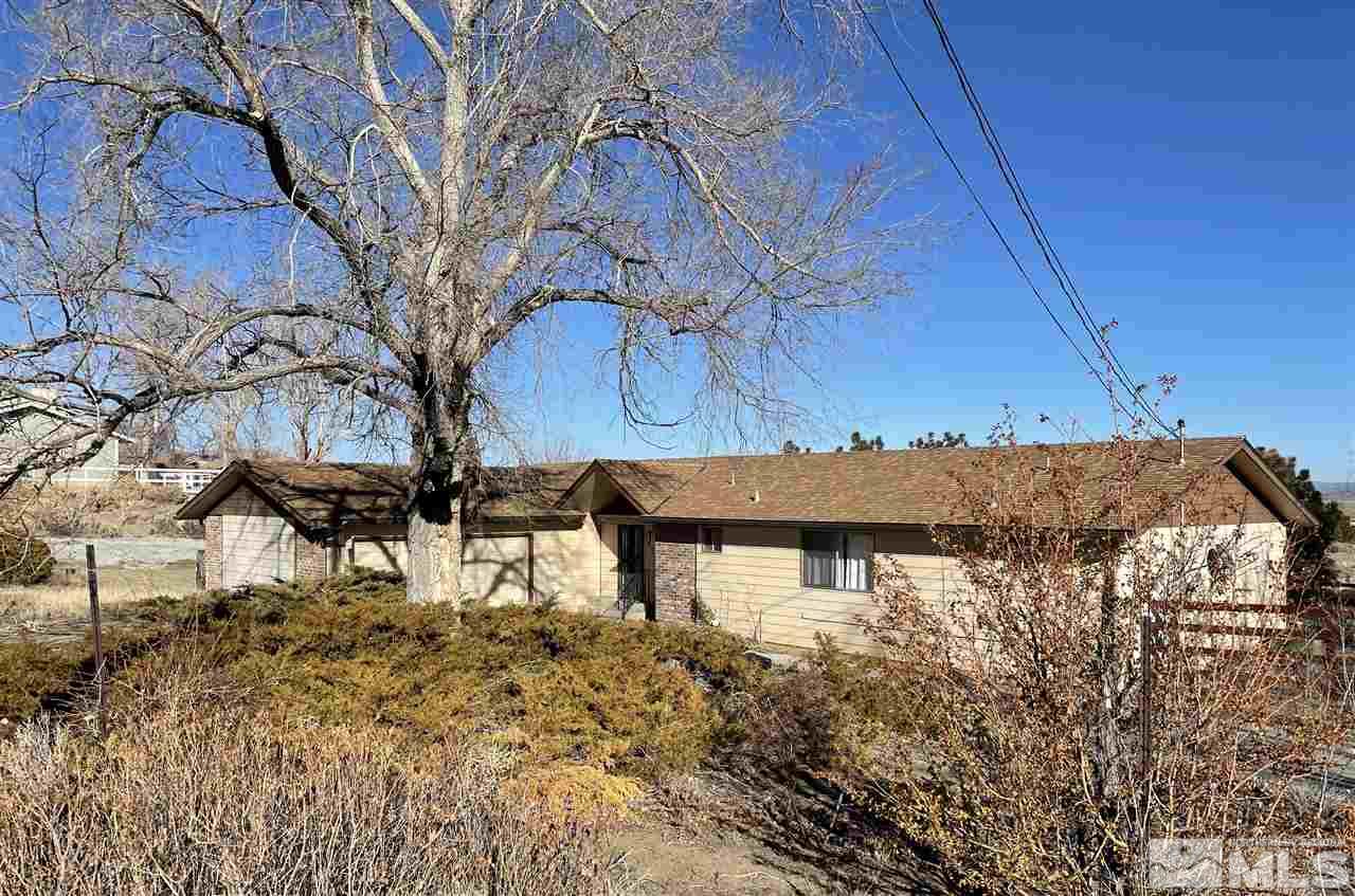 10790 North Red Rock Road Reno, NV 89508 - Photo 1 of 1 a view of a house with a yard