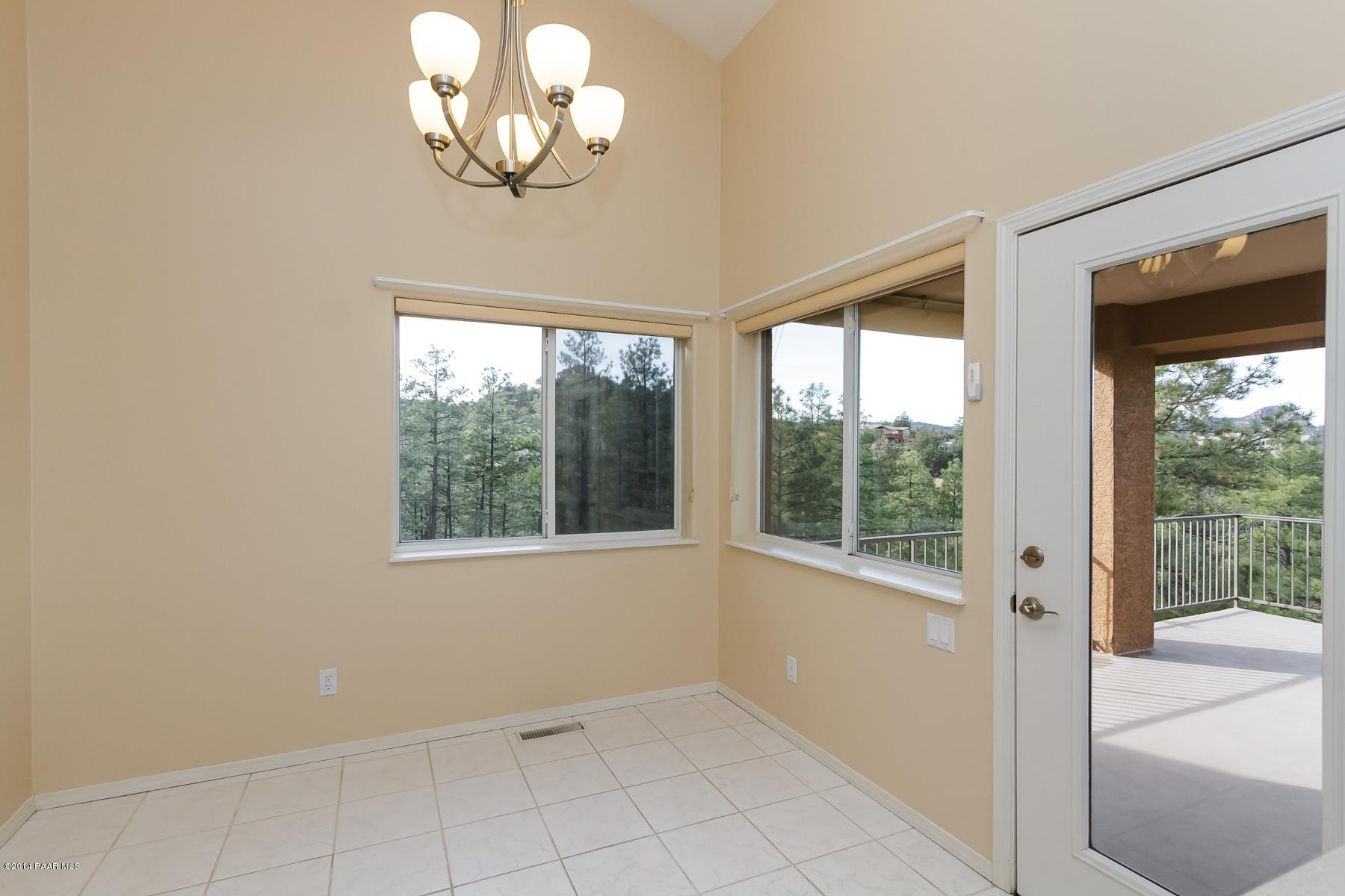 1380 East Valley View Road Prescott, AZ 86303 - Photo 17 of 36 a view of an empty room with a window