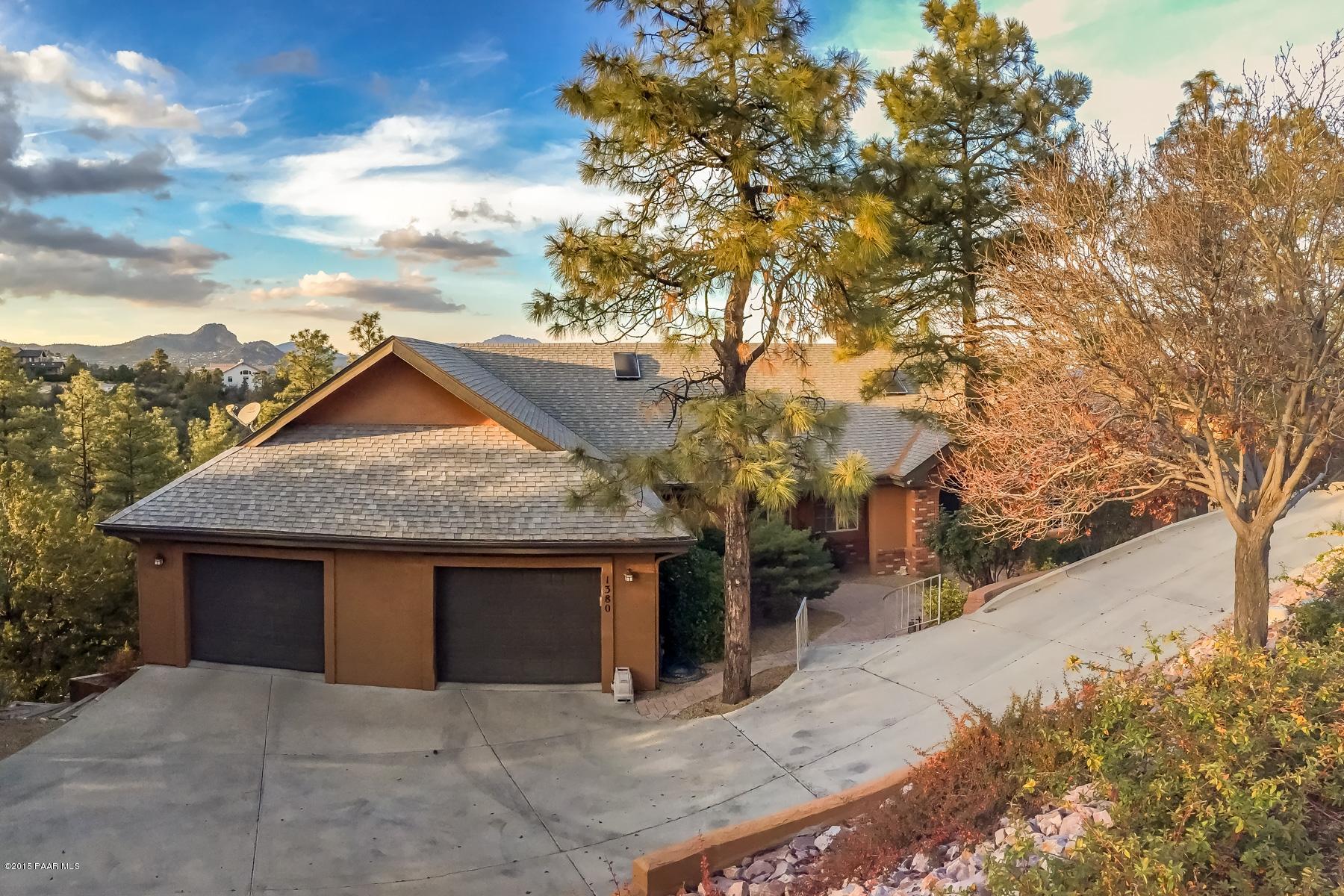 1380 East Valley View Road Prescott, AZ 86303 - Photo 2 of 36 a front view of a house with a yard