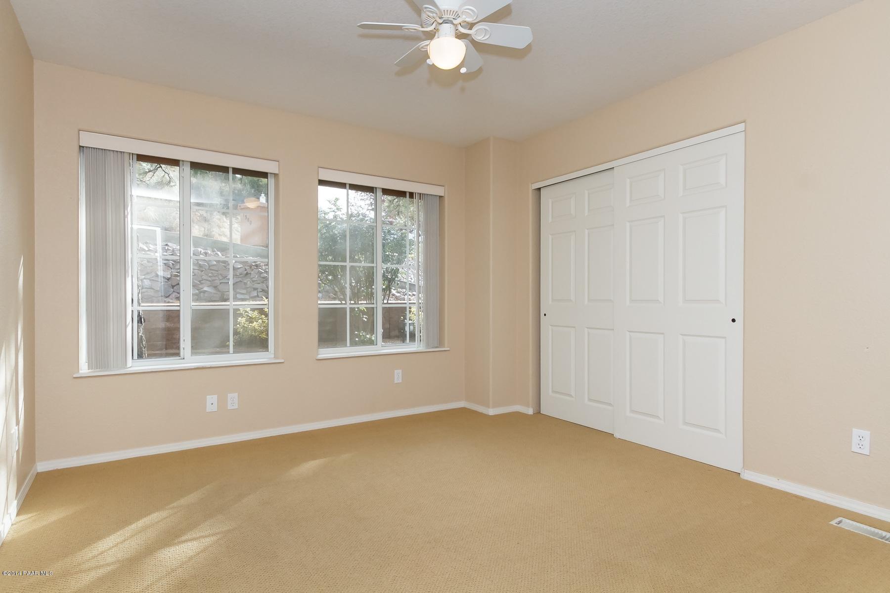 1380 East Valley View Road Prescott, AZ 86303 - Photo 29 of 36 an empty room with a window