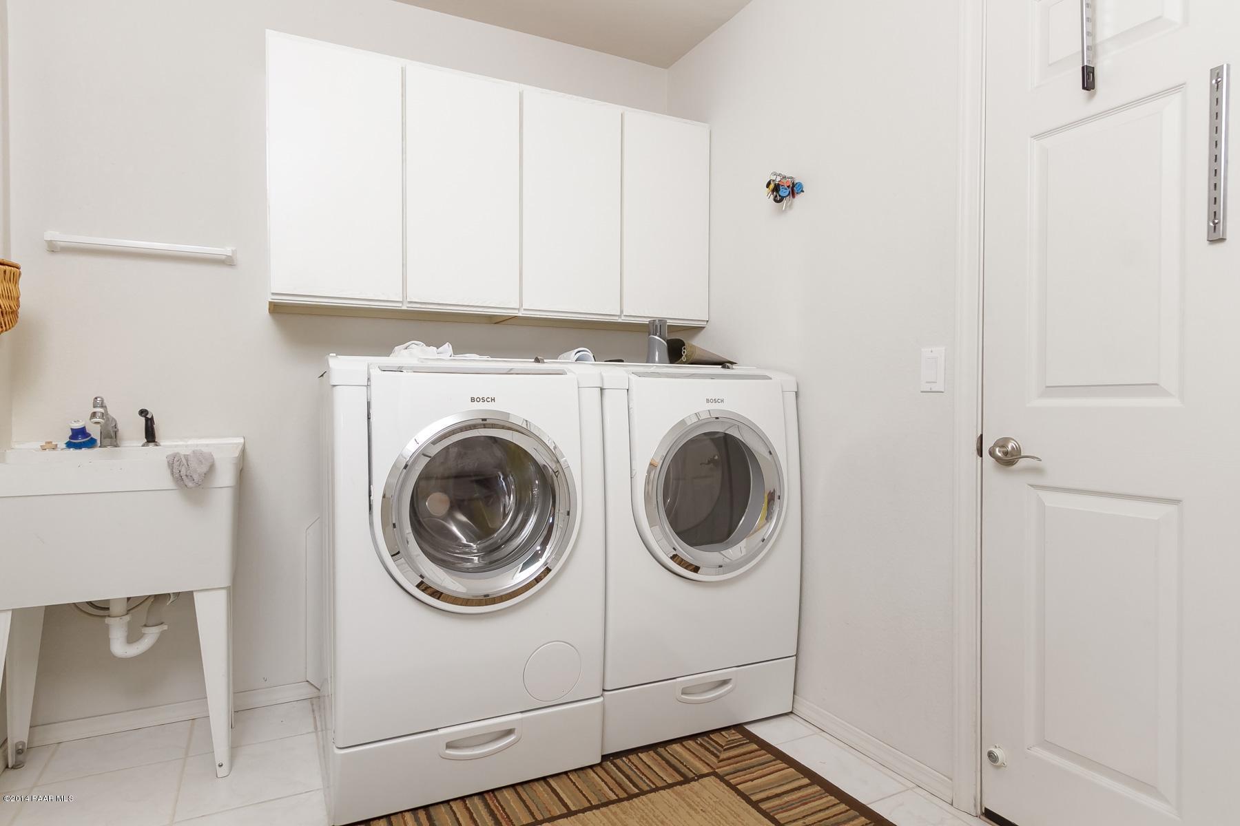 1380 East Valley View Road Prescott, AZ 86303 - Photo 32 of 36 a utility room with dryer and washer