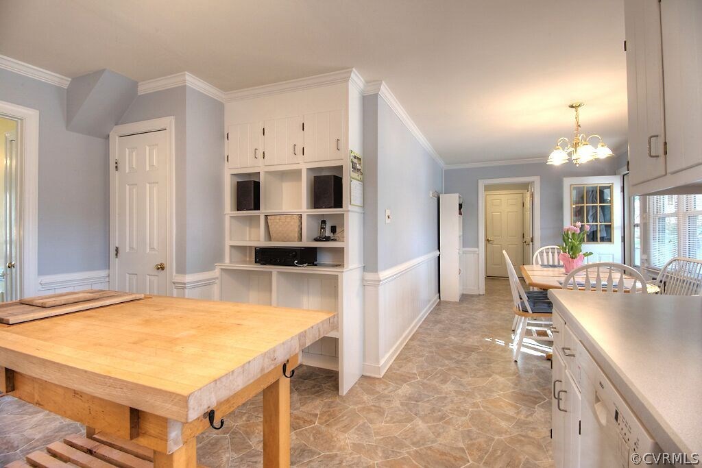 13325 Lady Ashley Road Midlothian, VA 23114 - Photo 12 of 31 a large kitchen with kitchen island a sink counter space and stainless steel appliances