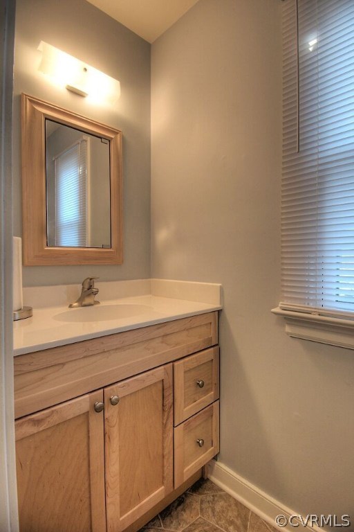 13325 Lady Ashley Road Midlothian, VA 23114 - Photo 16 of 31 a bathroom with a sink and a mirror