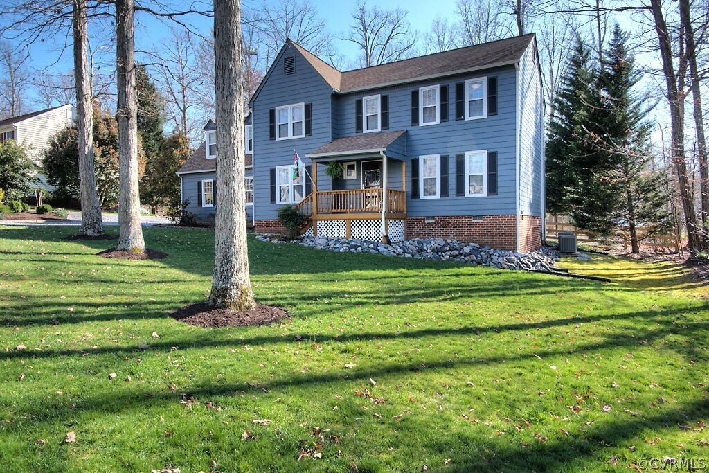 13325 Lady Ashley Road Midlothian, VA 23114 - Photo 2 of 31 a front view of a house with a yard