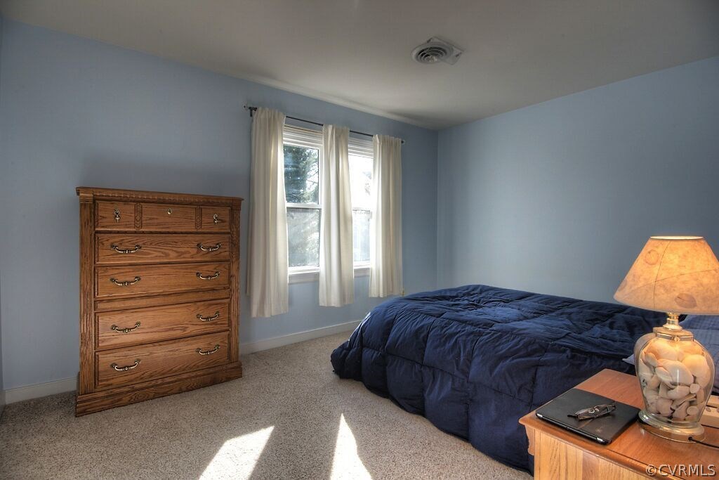 13325 Lady Ashley Road Midlothian, VA 23114 - Photo 21 of 31 a bedroom with a bed and a closet