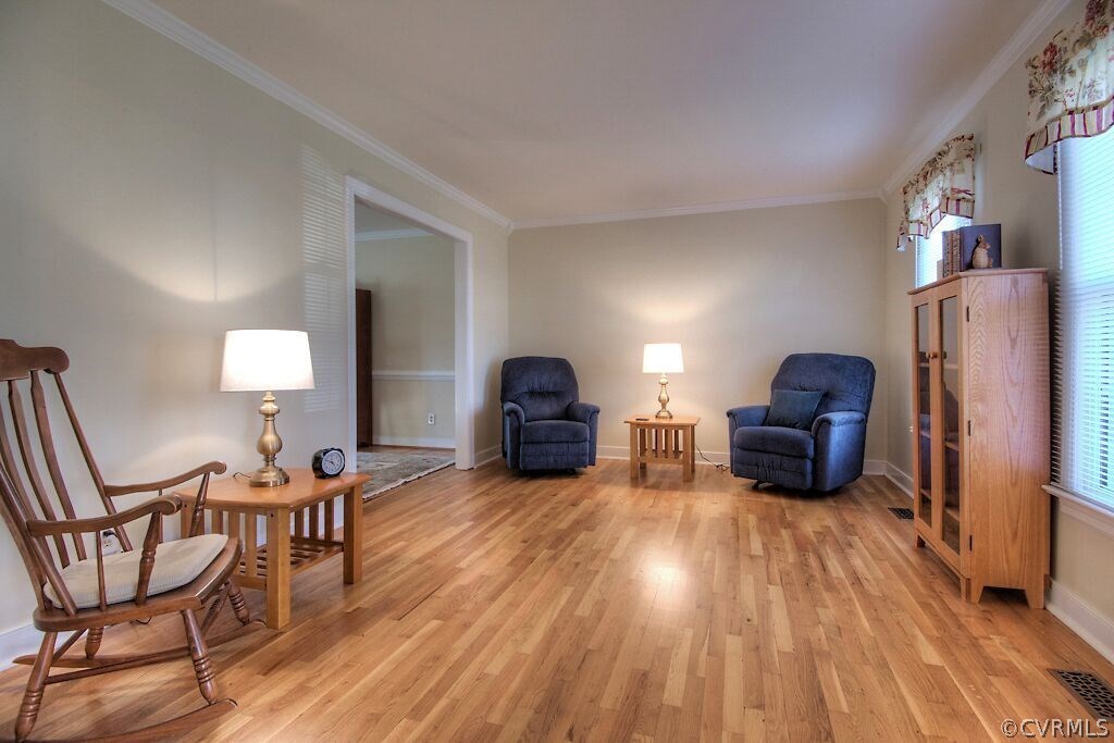 13325 Lady Ashley Road Midlothian, VA 23114 - Photo 6 of 31 a living room with furniture and a wooden floor