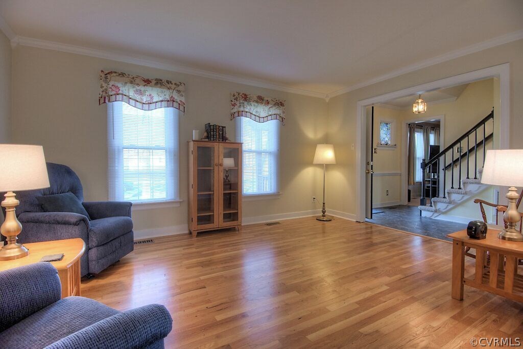 13325 Lady Ashley Road Midlothian, VA 23114 - Photo 7 of 31 a living room with furniture and a wooden floor