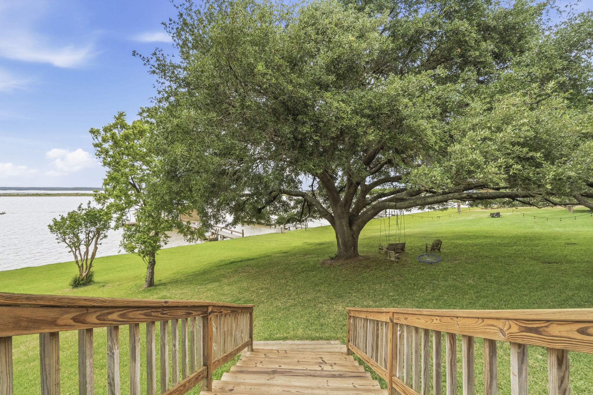 259 Memphis Bell Lane Trinity, TX 75862 - Photo 34 of 50 a view of a pathway with a wrought fence