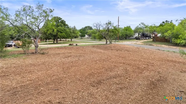 a view of road with trees