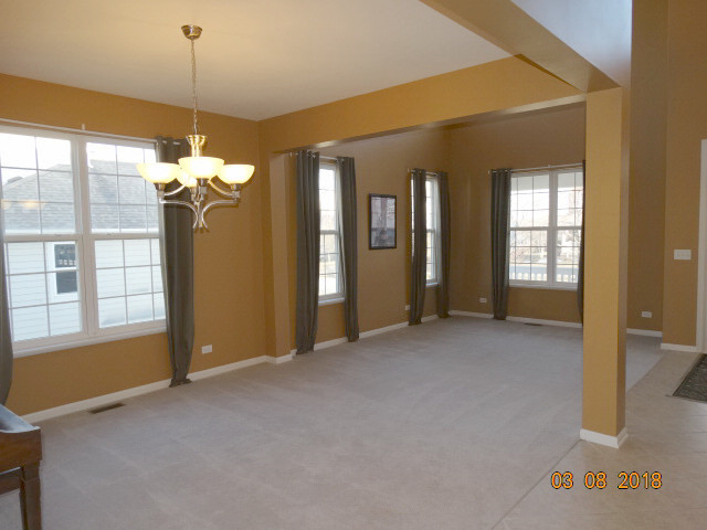 314 Monument Road Elgin, IL 60124 - Photo 16 of 16 a view of an empty room with a window