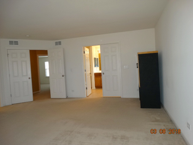 314 Monument Road Elgin, IL 60124 - Photo 8 of 16 a view of empty room with window