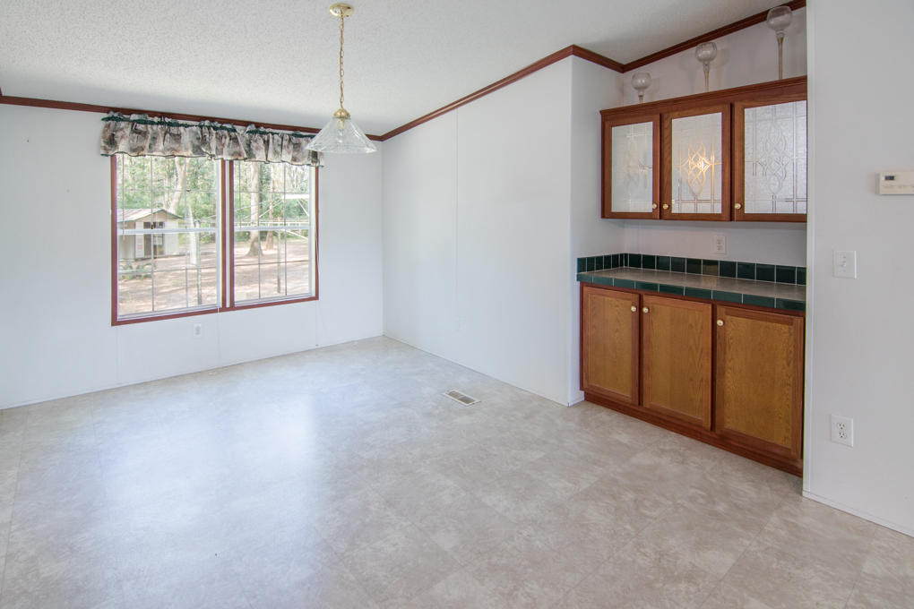423 Tedder Road East DeFuniak Springs, FL 32433 - Photo 14 of 29 a view of an empty room with a window