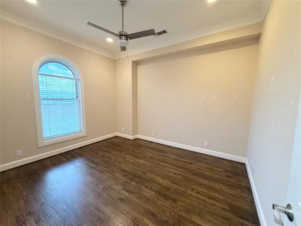 a view of room with window and hardwood floor