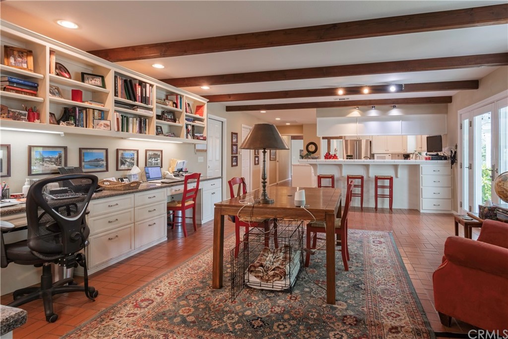 2755 Ardilla Road Atascadero, CA 93422 - Photo 16 of 42 a view of a dining room with furniture a rug and wooden floor