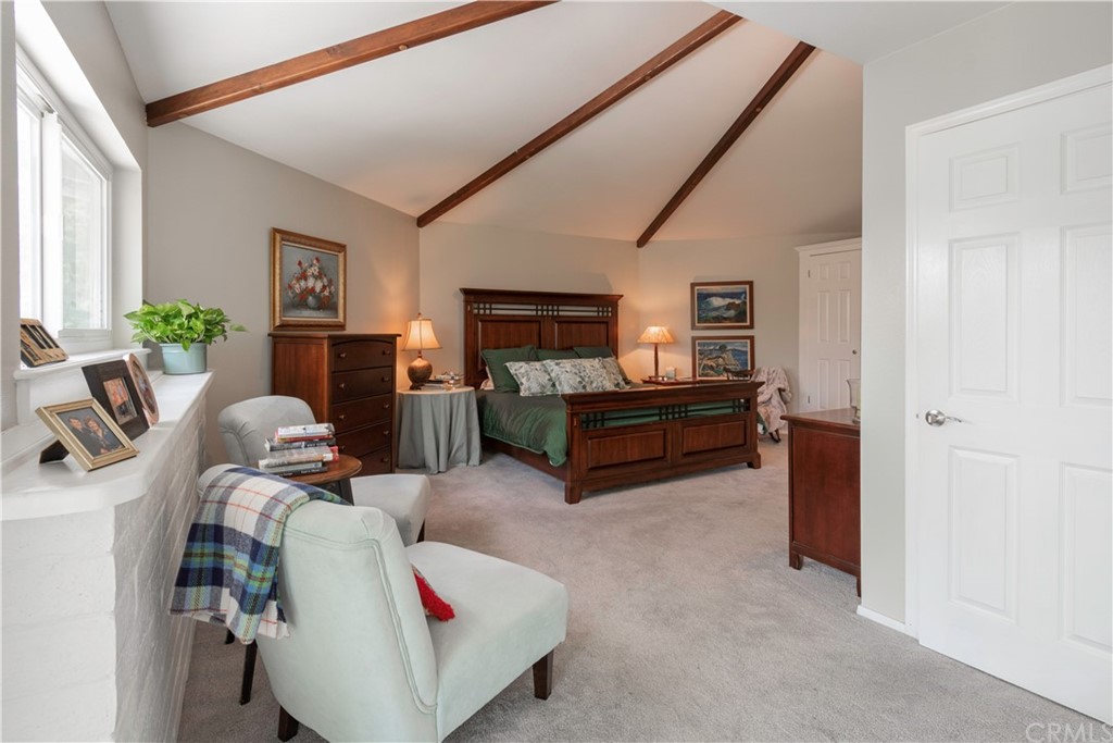 2755 Ardilla Road Atascadero, CA 93422 - Photo 17 of 42 a living room with furniture and a flat screen tv