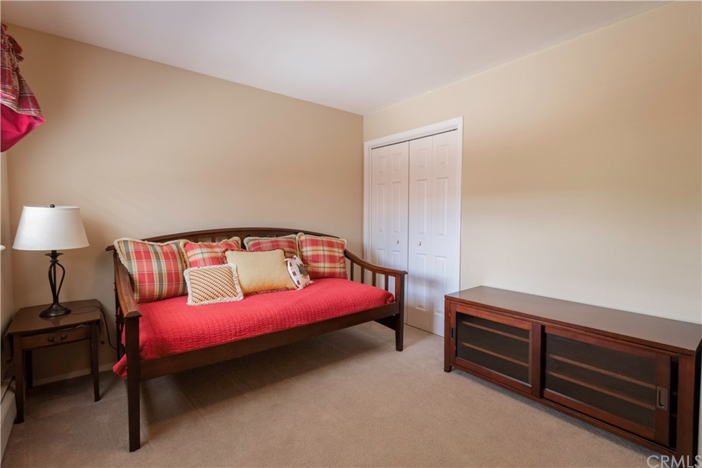 2755 Ardilla Road Atascadero, CA 93422 - Photo 22 of 42 a bedroom with a bed and a dresser