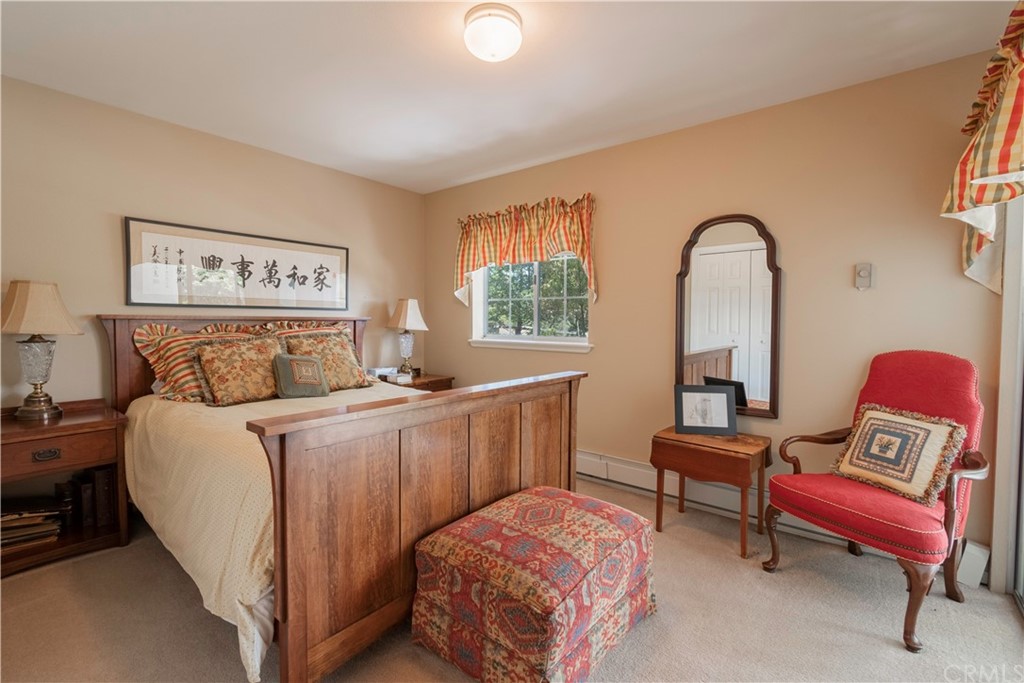 2755 Ardilla Road Atascadero, CA 93422 - Photo 23 of 42 a bedroom with bed and a window