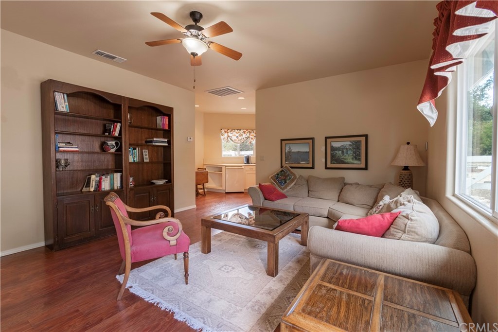 2755 Ardilla Road Atascadero, CA 93422 - Photo 34 of 42 a living room with furniture rug and window