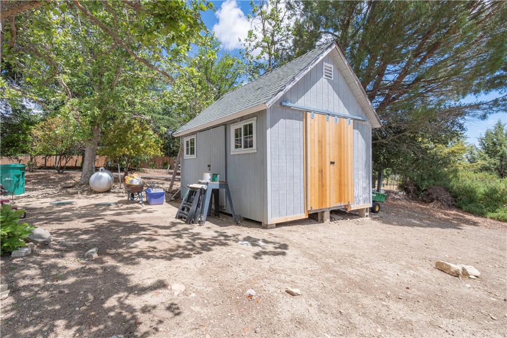 2755 Ardilla Road Atascadero, CA 93422 - Photo 37 of 42 a view of backyard with a patio and a garden