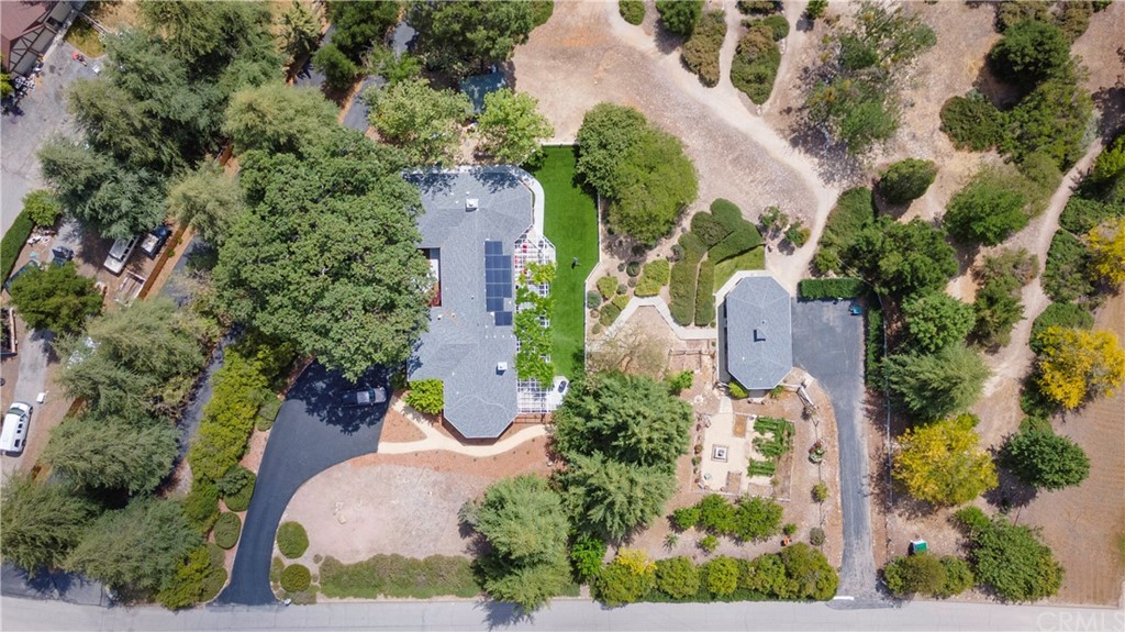 2755 Ardilla Road Atascadero, CA 93422 - Photo 40 of 42 an aerial view of a house with a garden and trees