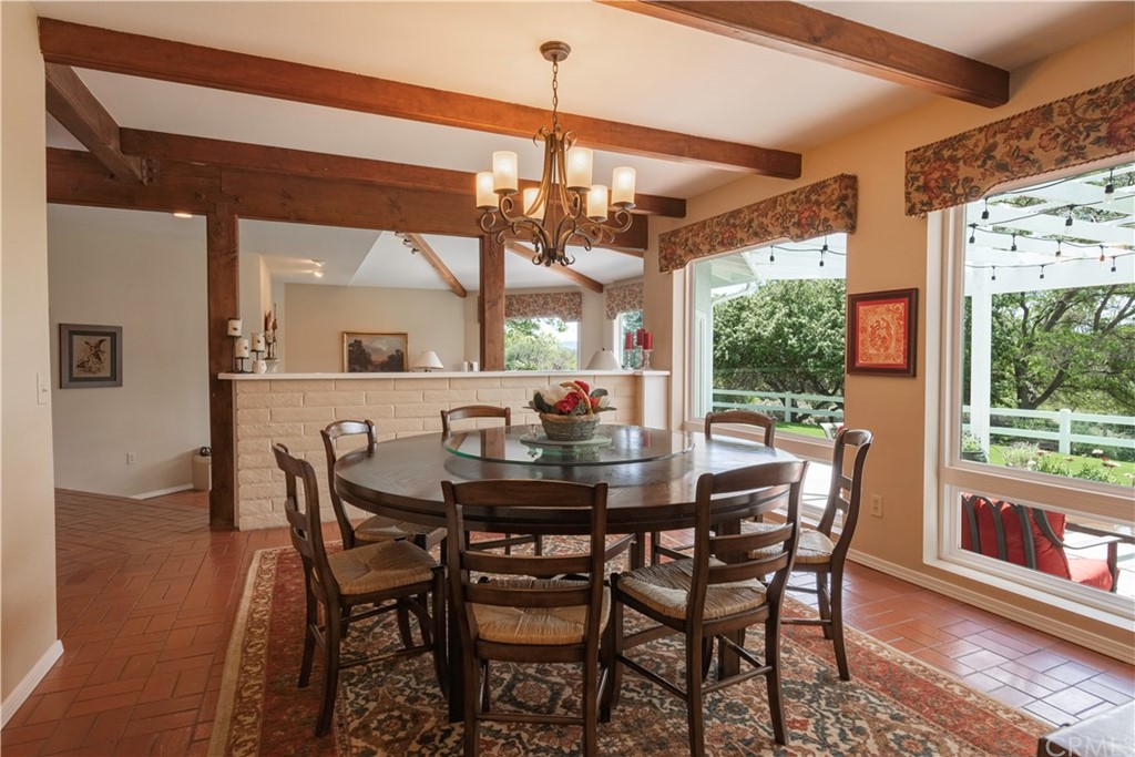 2755 Ardilla Road Atascadero, CA 93422 - Photo 9 of 42 a view of a dining room with furniture window and outside view
