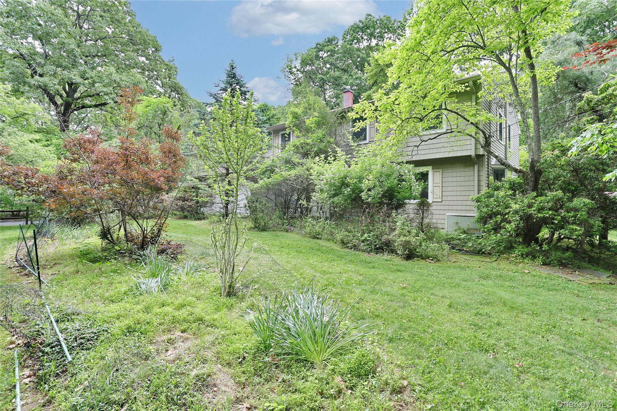 8 Swallow Avenue Spring Valley, NY 10977 - Photo 21 of 28 a view of a house with a backyard