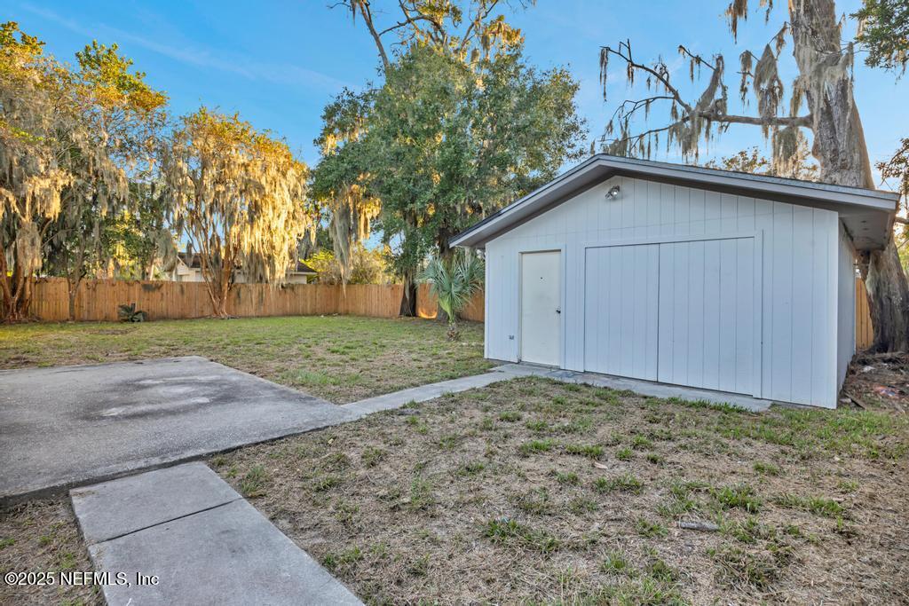 1050 Glynlea Road Jacksonville, FL 32216 - Photo 3 of 38 a view of a house with a yard