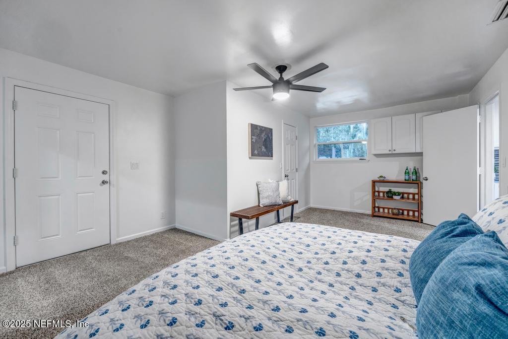 1050 Glynlea Road Jacksonville, FL 32216 - Photo 36 of 38 a bedroom with a bed and dresser