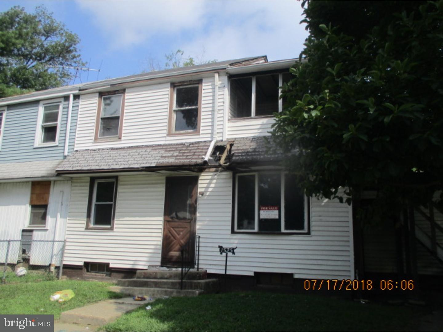 1525 Collings Road Camden, NJ 08104 - Photo 1 of 7 a front view of a house with a yard