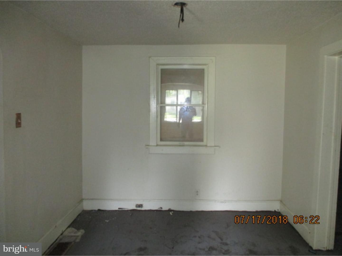 1525 Collings Road Camden, NJ 08104 - Photo 3 of 7 an empty room with a window