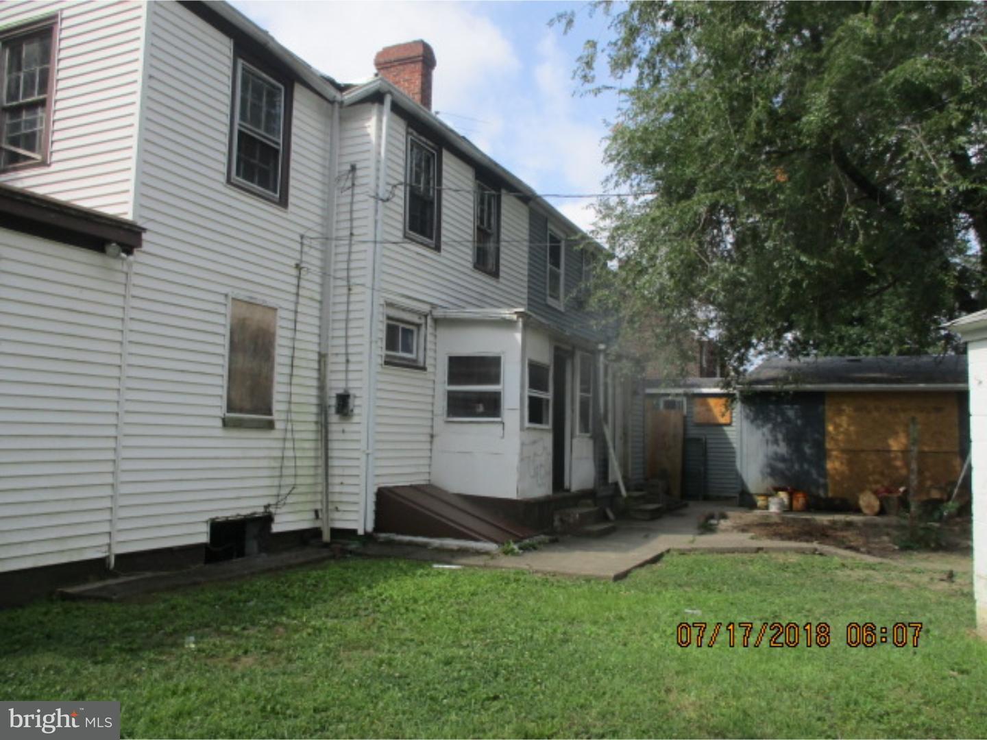1525 Collings Road Camden, NJ 08104 - Photo 7 of 7 a view of a backyard with a garden