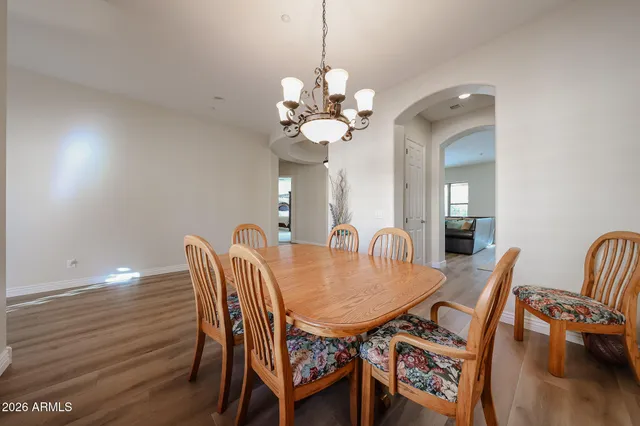 a view of a livingroom with furniture and a ceiling fan