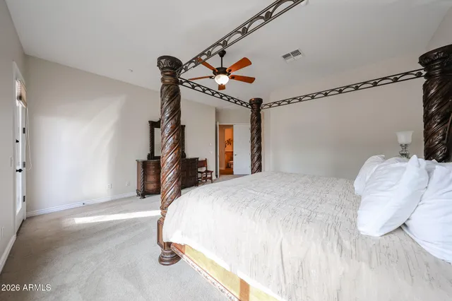 a view of a livingroom with furniture and a window