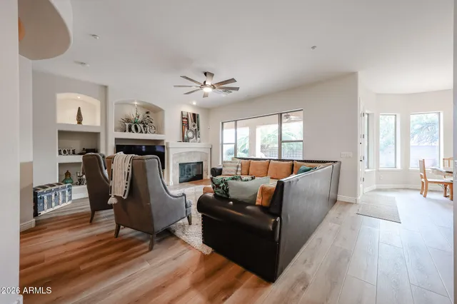 a kitchen with kitchen island granite countertop a center island cabinets and stainless steel appliances