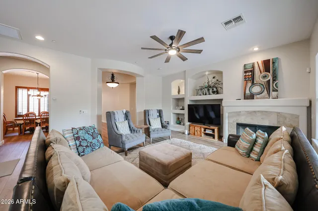 a kitchen with granite countertop stainless steel appliances and wooden cabinets