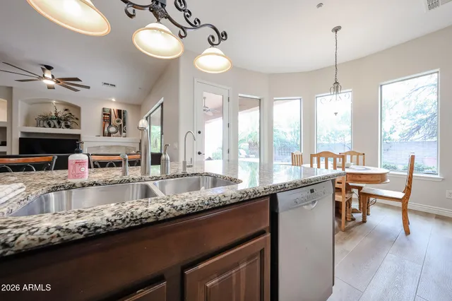 a view of a swimming pool with a backyard