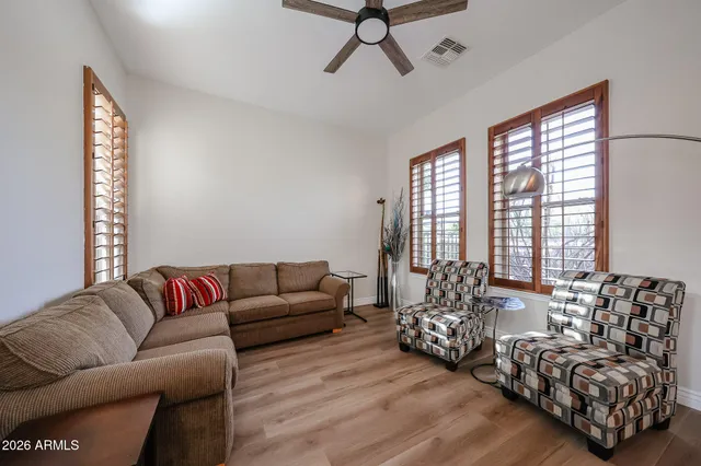 a bed room with a bed and a window