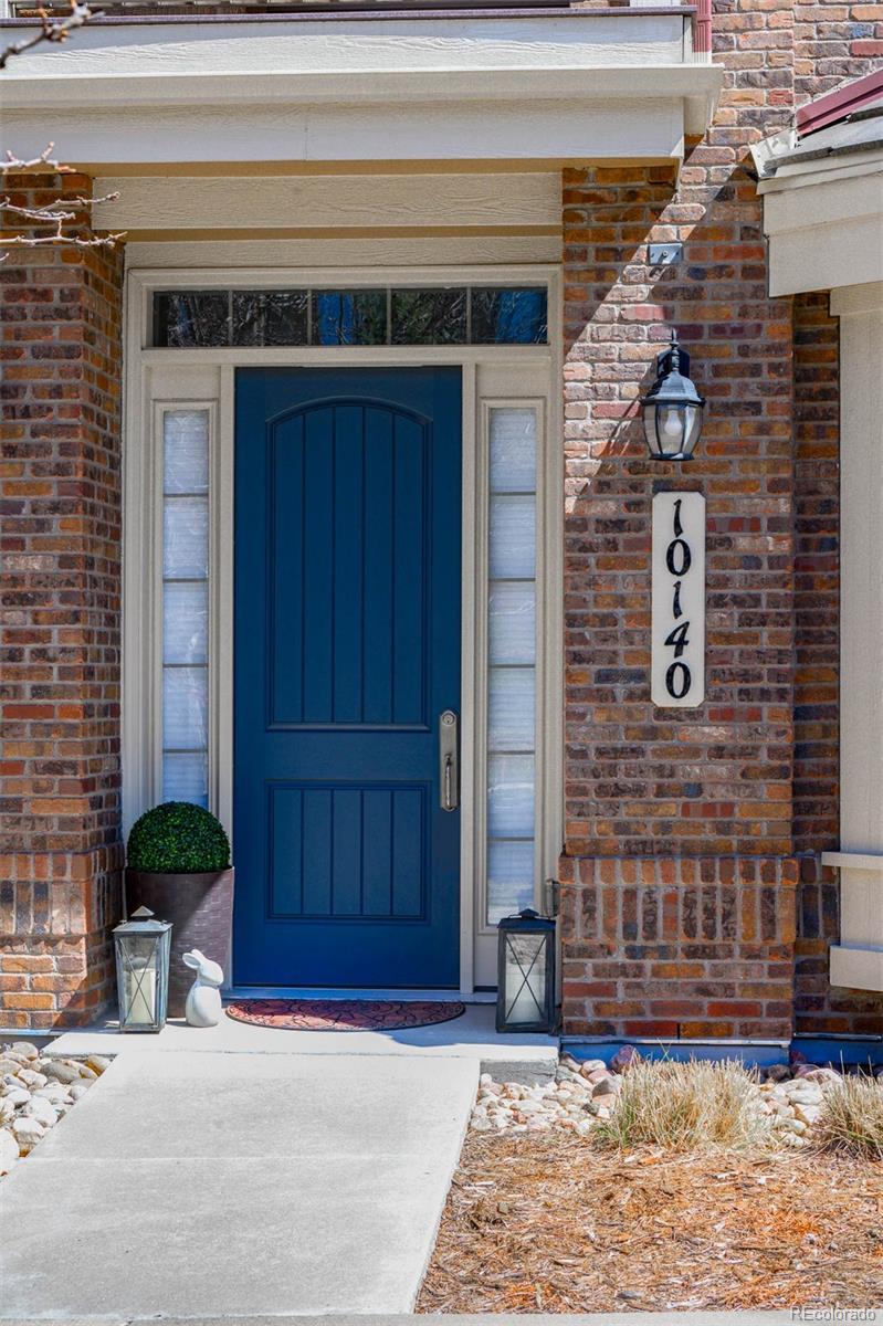 10140 RidgeGate Circle Lone Tree, CO 80124 - Photo 4 of 32 a view of entrance door of the house