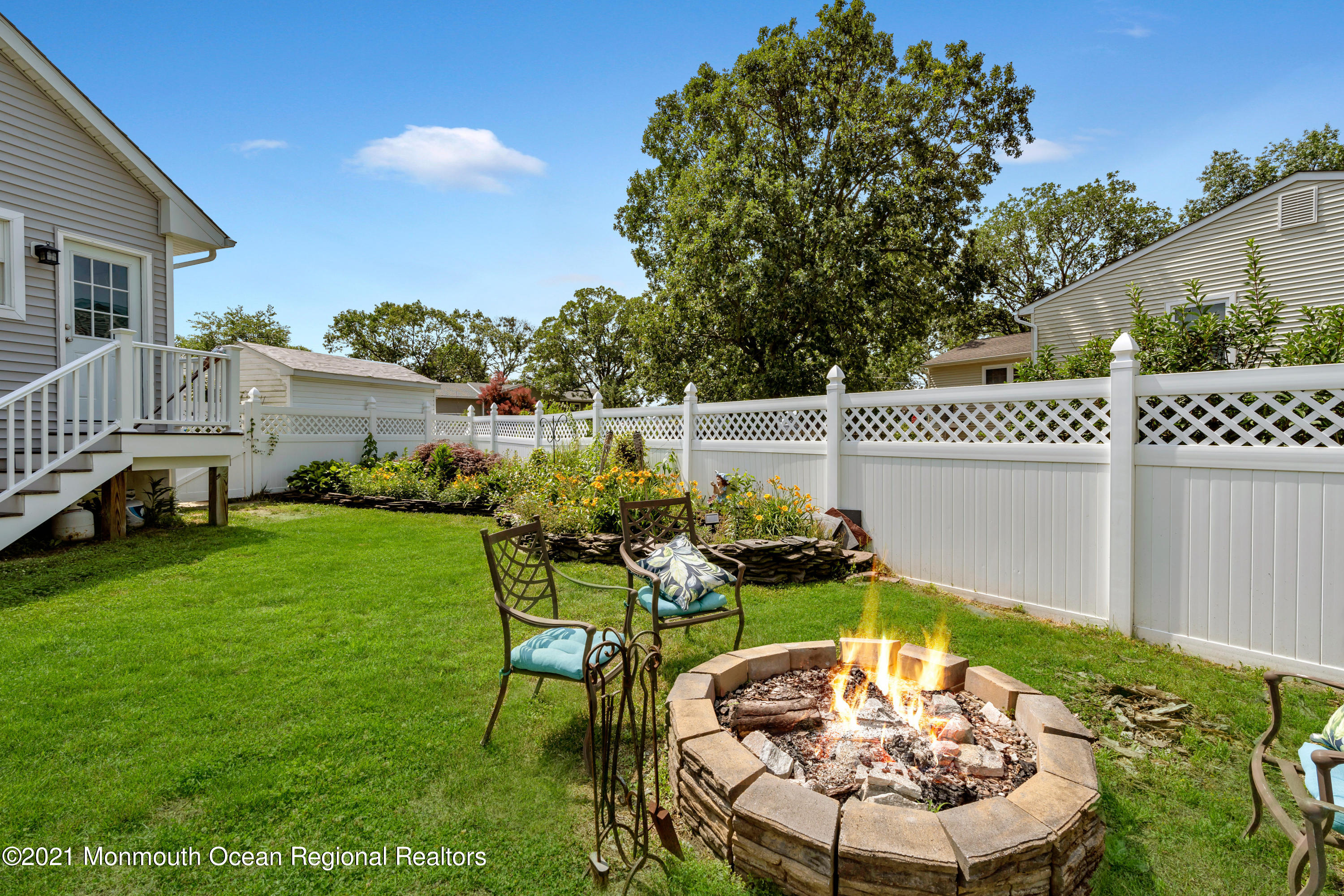80 Port Road Brick, NJ 08723 - Photo 18 of 29 a swimming pool with outdoor seating and plants