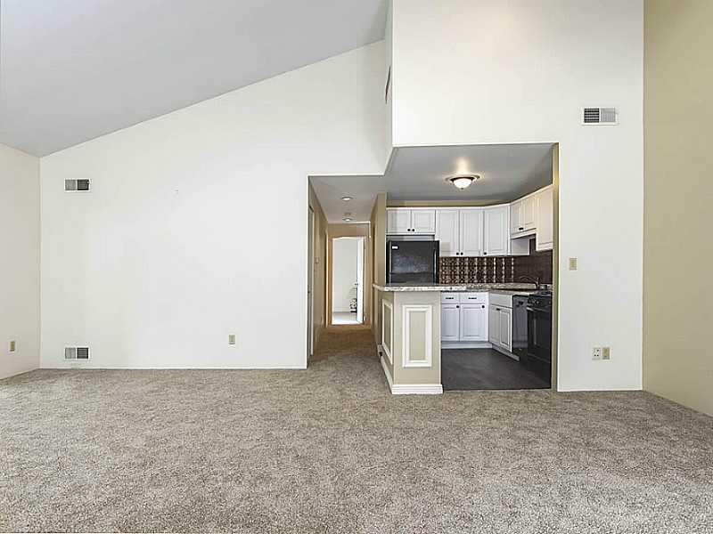 1303 Kenzie Road Pittsburgh, PA 15205 - Photo 4 of 25 Living Room. New carpet throughout the unit.
