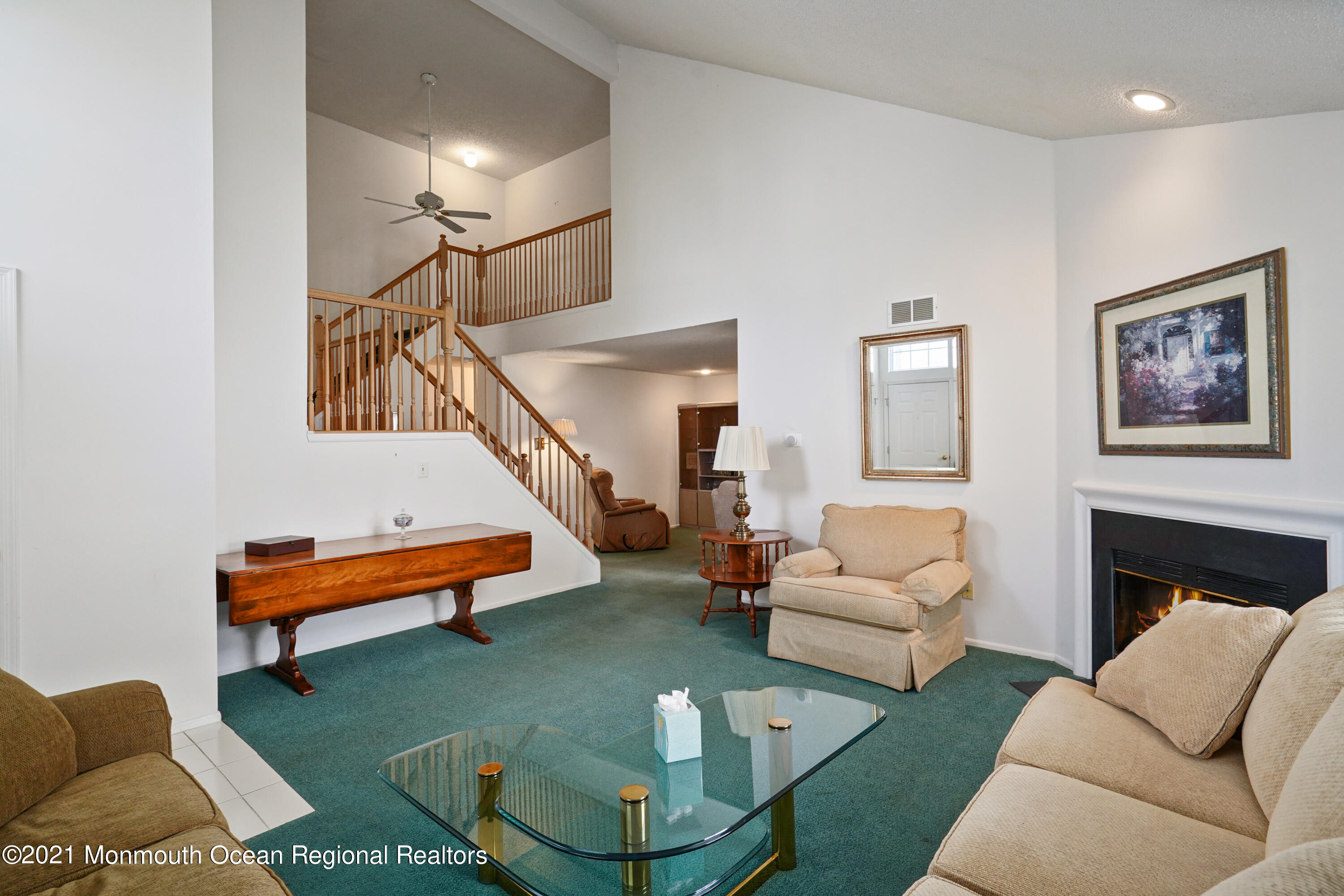 44 Racquet Road Wall, NJ 07719 - Photo 13 of 21 a living room with furniture and a fireplace