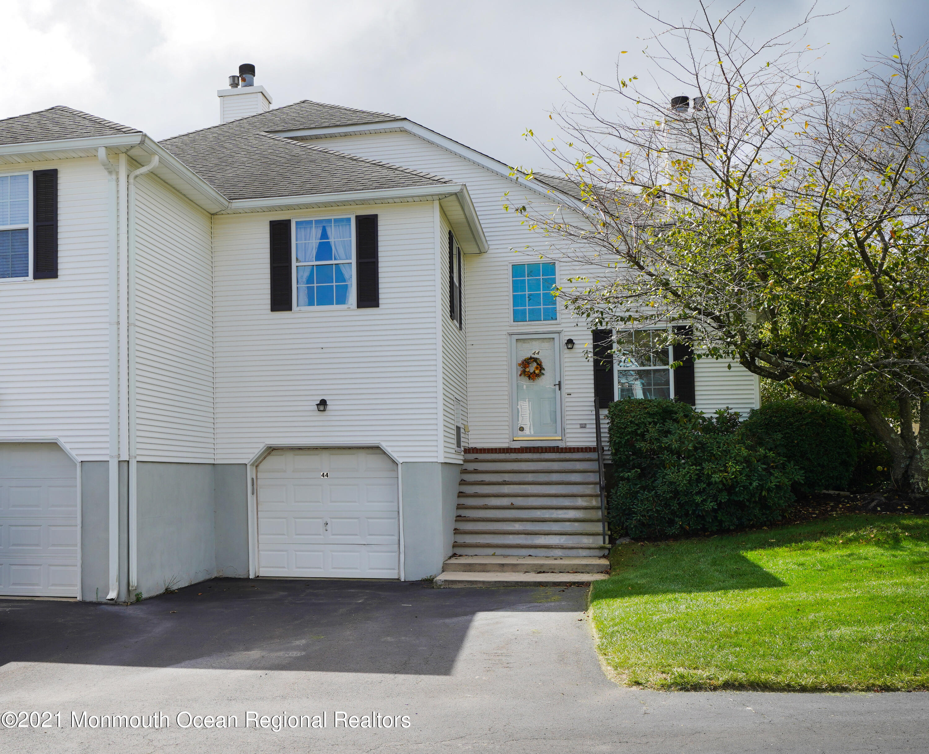 44 Racquet Road Wall, NJ 07719 - Photo 18 of 21 a front view of a house with a yard