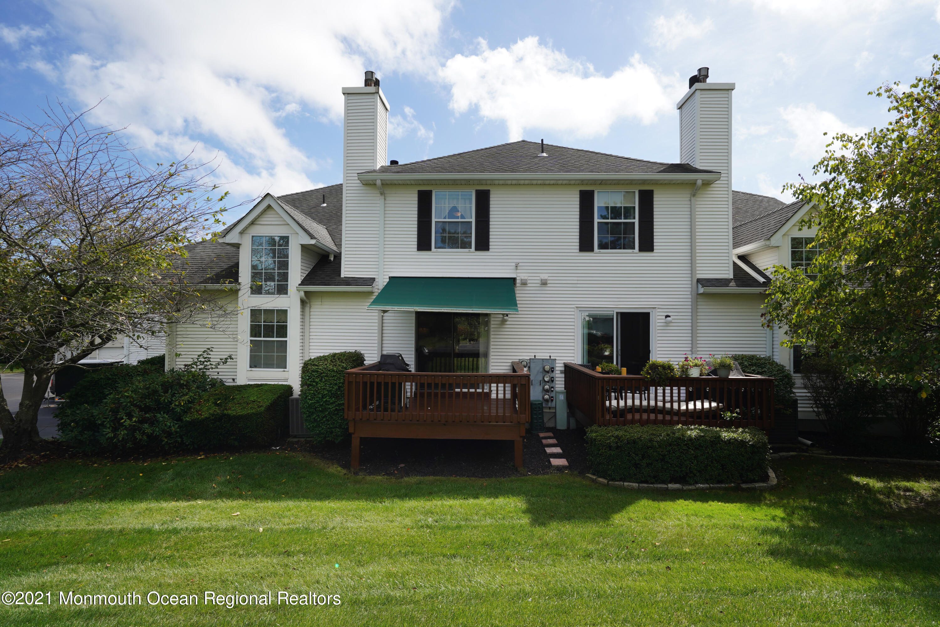 44 Racquet Road Wall, NJ 07719 - Photo 20 of 21 a front view of a house with a garden