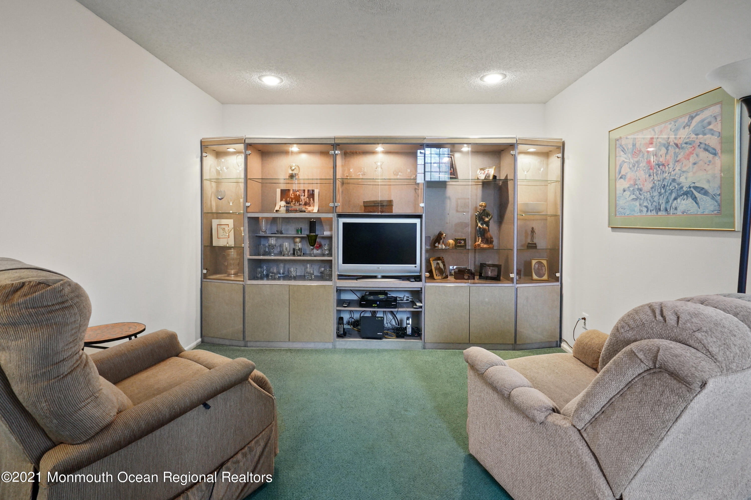 44 Racquet Road Wall, NJ 07719 - Photo 3 of 21 a living room with furniture and a flat screen tv