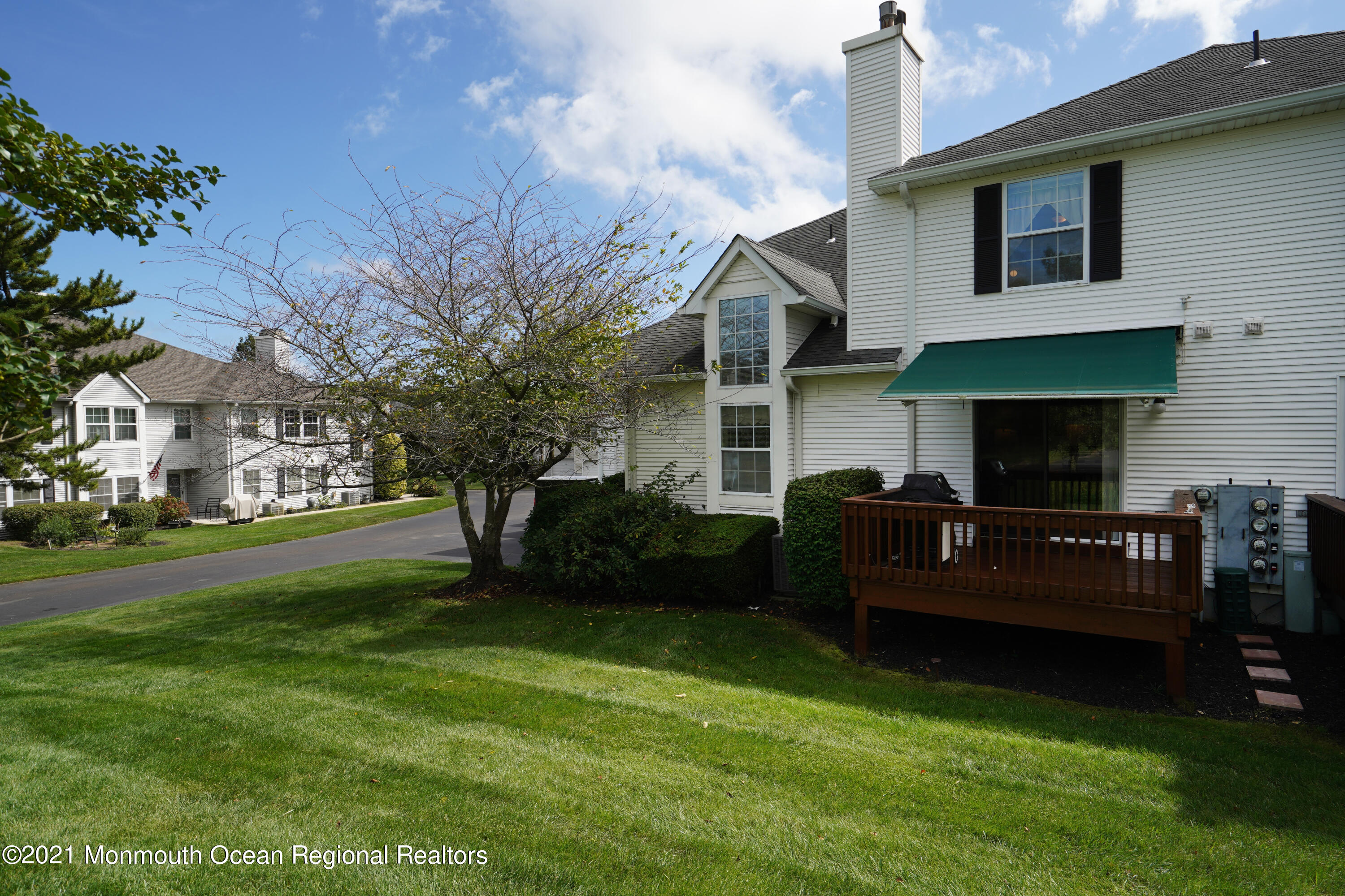 44 Racquet Road Wall, NJ 07719 - Photo 21 of 21 a view of a house with a back yard