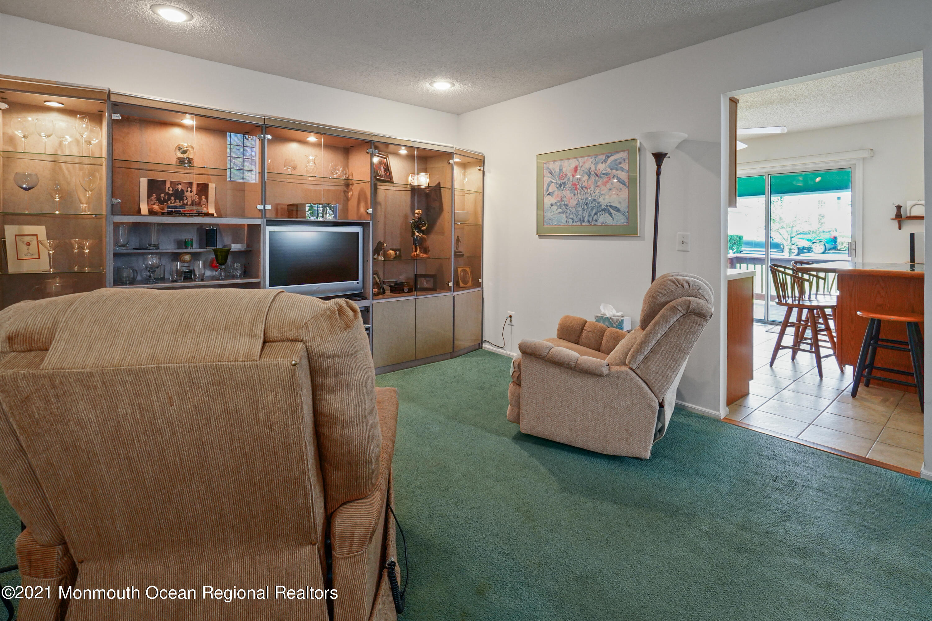 44 Racquet Road Wall, NJ 07719 - Photo 4 of 21 a living room with furniture and a flat screen tv