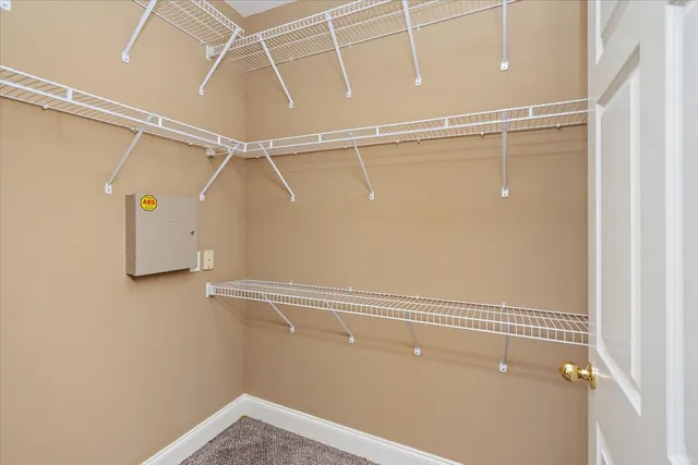 a view of a room with racks on the wall